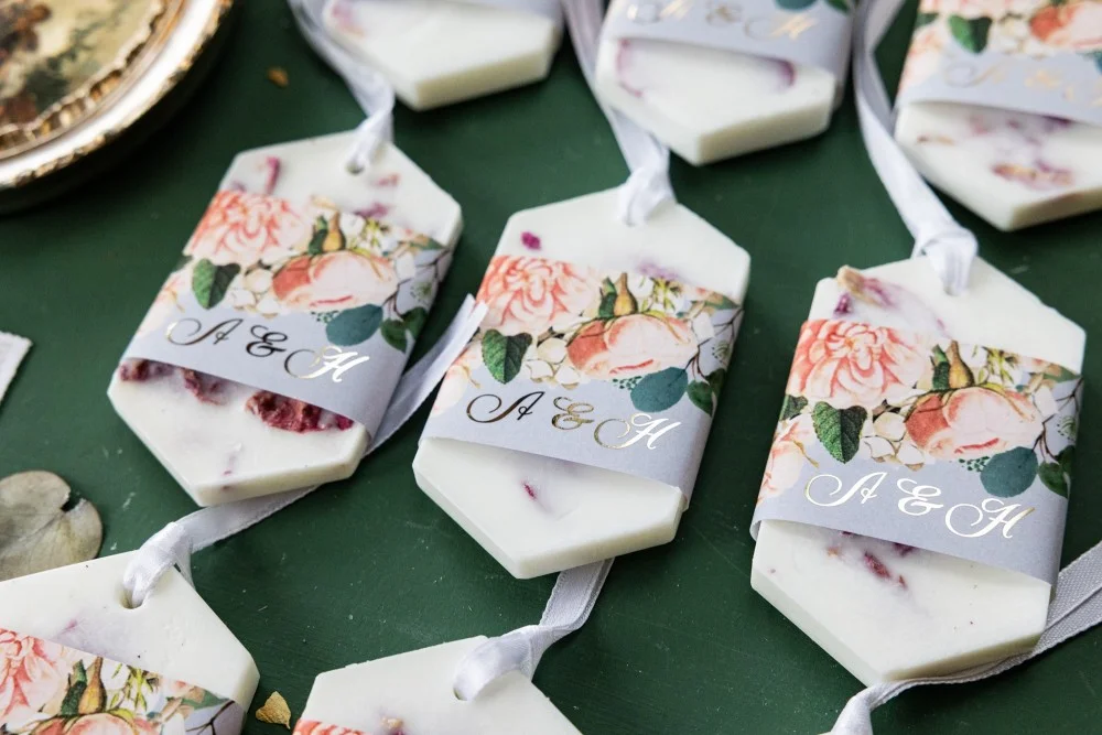 Personalized, handmade Soy Wax Favors for your Wedding Guests with gold text.