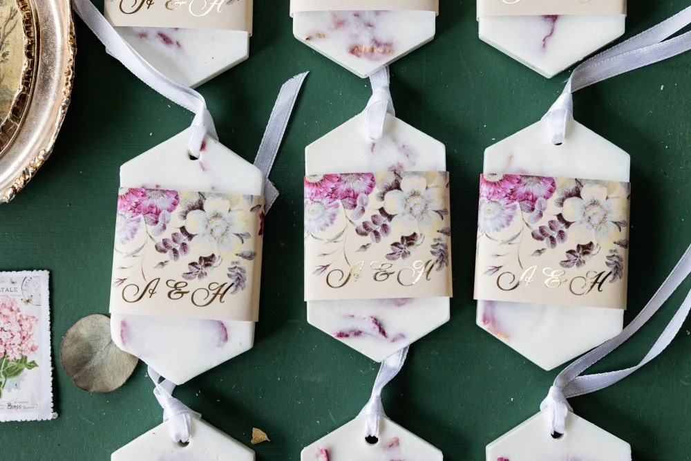 Personalized, handmade Soy Wax Favors for your Wedding Guests with gold text.