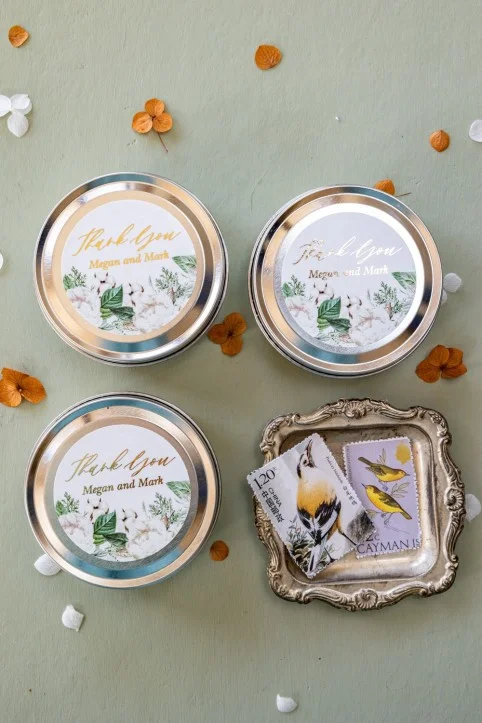 Personalized, handmade Soy Wax Candles Favors for your Wedding Guests with gold text and winter flowers