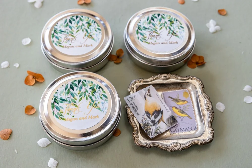 Personalized, handmade Soy Wax Candles Favors for your Wedding Guests with gold text and lilies of the valley