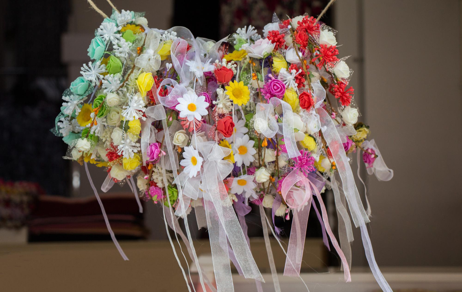 olorful crowns made of fake flowers