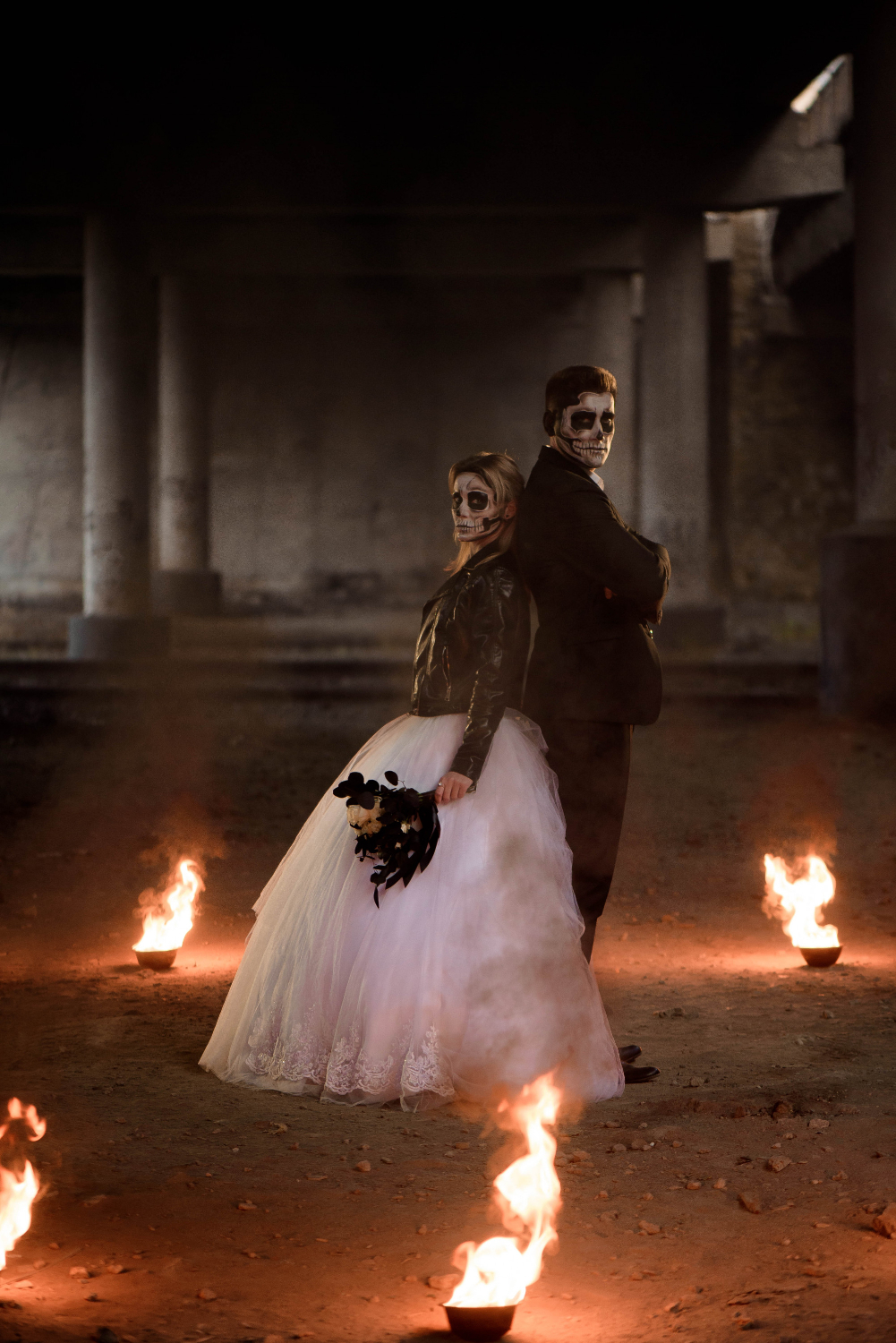  dressed in wedding clothes romantic zombie couple.