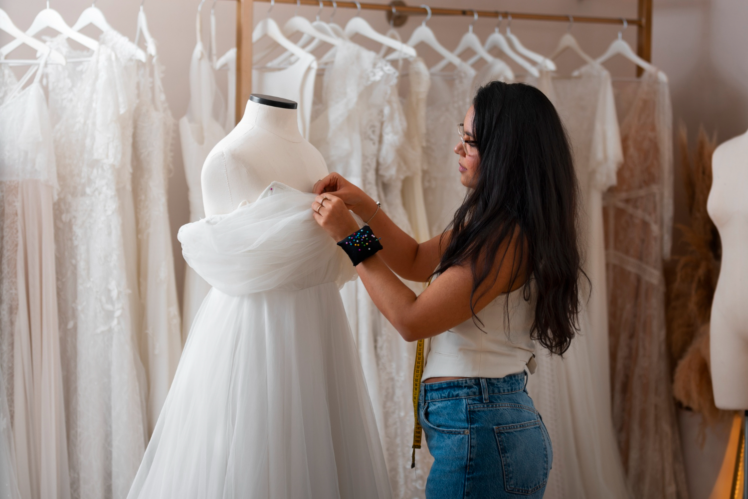  brazilian woman working as wedding clothing designer