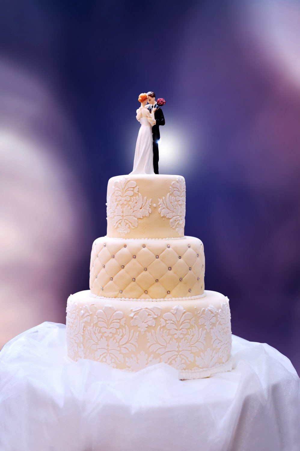 white wedding cake on table